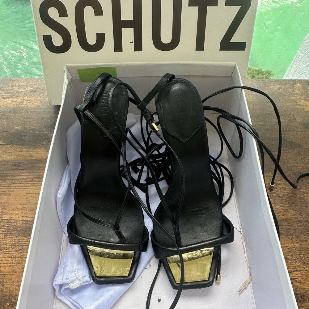 Schutz Black and Gold Strappy Heels